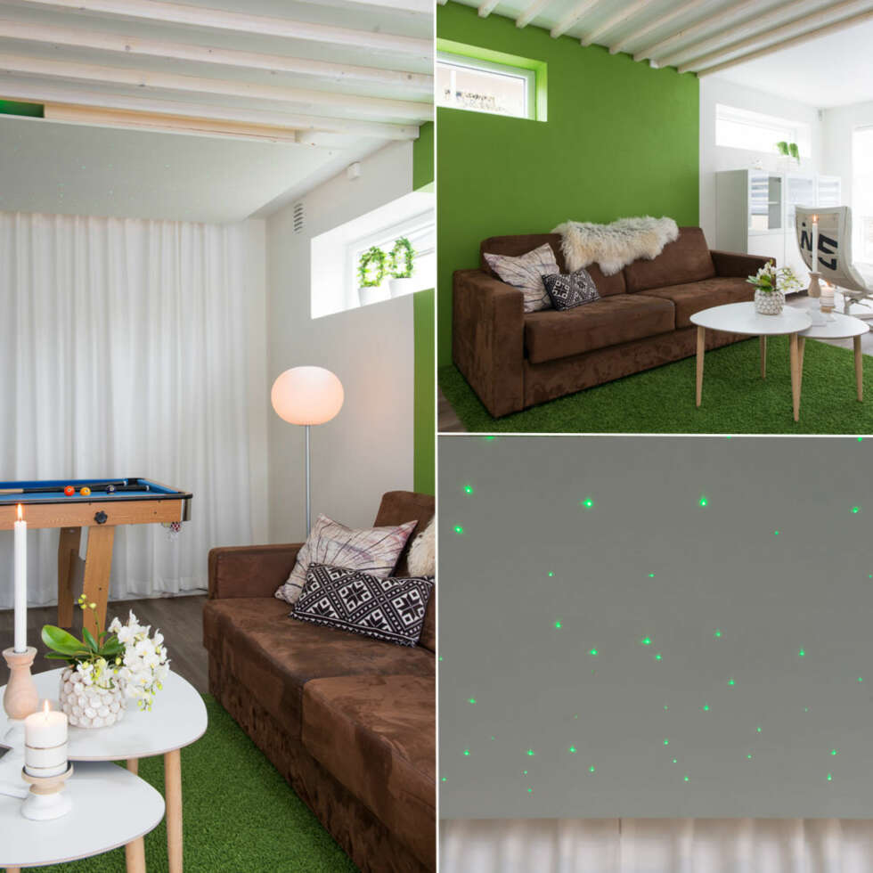 GARASJE: På veggen og i taket i den grønne sonen er det hvitmalede trespiler. Puffen er fra Ygg&Lyng, hyllene fra Ikea og det grønne tepppet er fra Touchan-T, farge Loft 6559, Prosjektgulv. Bordet Kleppe kan skyves i hverandre til ett bord. Den grønne fargen på veggen harmonerer med det grønne teppet. Fargekode S 3050-G40Y. Den svevende himmelen er fra Bø Installasjon. GARASJE: På veggen og i taket i den grønne sonen er det hvitmalede trespiler. Puffen er fra Ygg&Lyng, hyllene fra Ikea og det grønne tepppet er fra Touchan-T, farge Loft 6559, Prosjektgulv. Bordet Kleppe kan skyves i hverandre til ett bord. Den grønne fargen på veggen harmonerer med det grønne teppet. Fargekode S 3050-G40Y. Den svevende himmelen er fra Bø Installasjon.