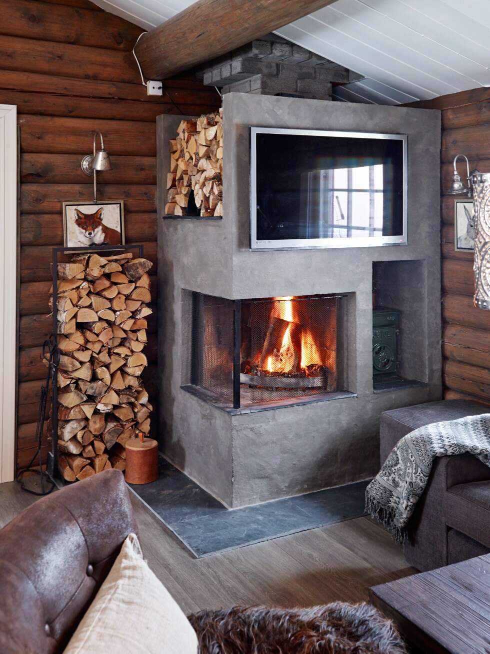 STRAM PEIS: En gammel rød tegelsteinspeis er gjort om til et stilrent, moderne ildsted.
Det ble bygget på peisen med lettbetongblokker. Peisen ble deretter slemmet og malt med spesialmalingen pure & original. STRAM PEIS: En gammel rød tegelsteinspeis er gjort om til et stilrent, moderne ildsted.
Det ble bygget på peisen med lettbetongblokker. Peisen ble deretter slemmet og malt med spesialmalingen pure & original.