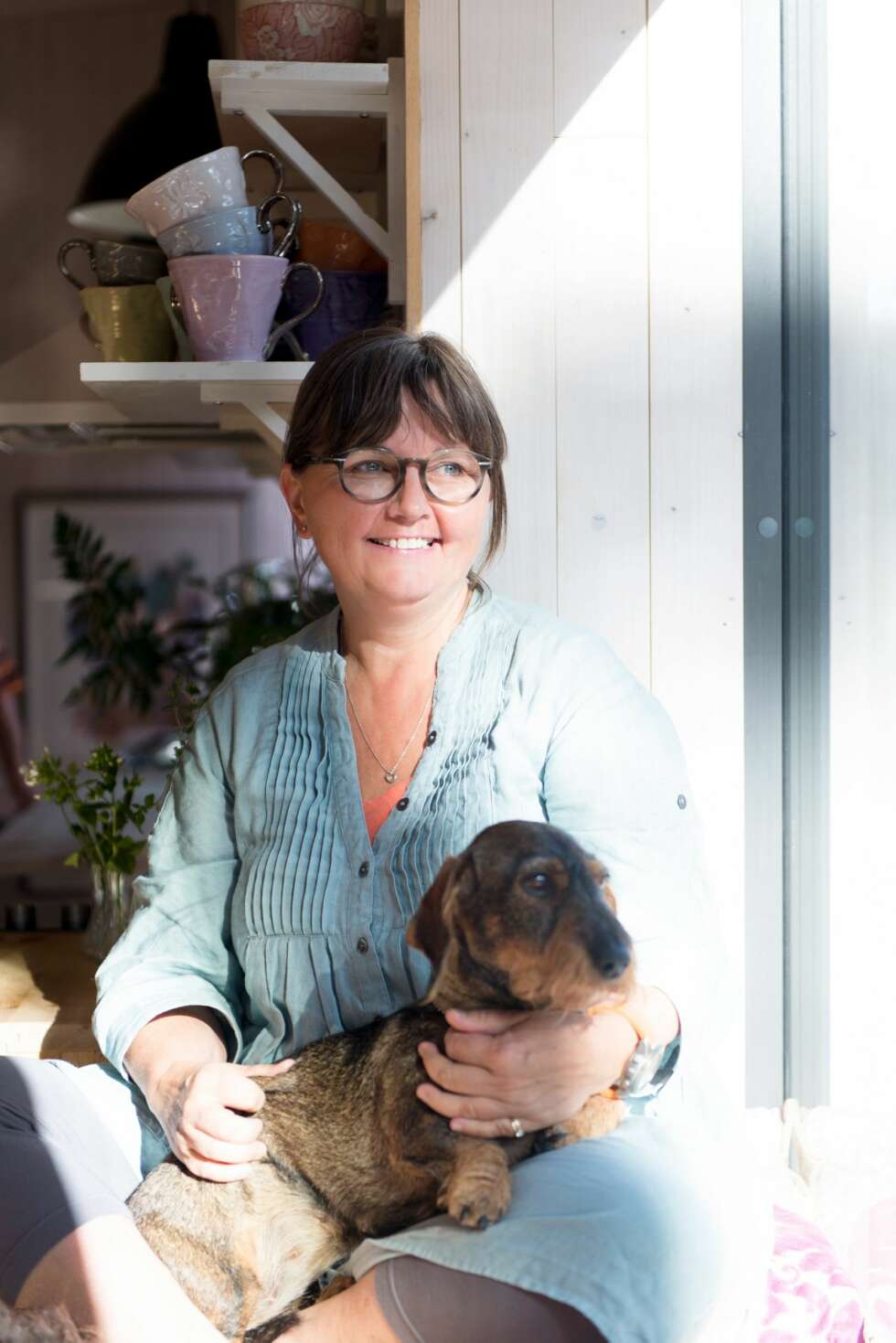Britt Bonna Ringerike ville ha et hus som skjermet mot veien bakenfor, men som ivaretok kontakten med naturen. Britt Bonna Ringerike ville ha et hus som skjermet mot veien bakenfor, men som ivaretok kontakten med naturen.