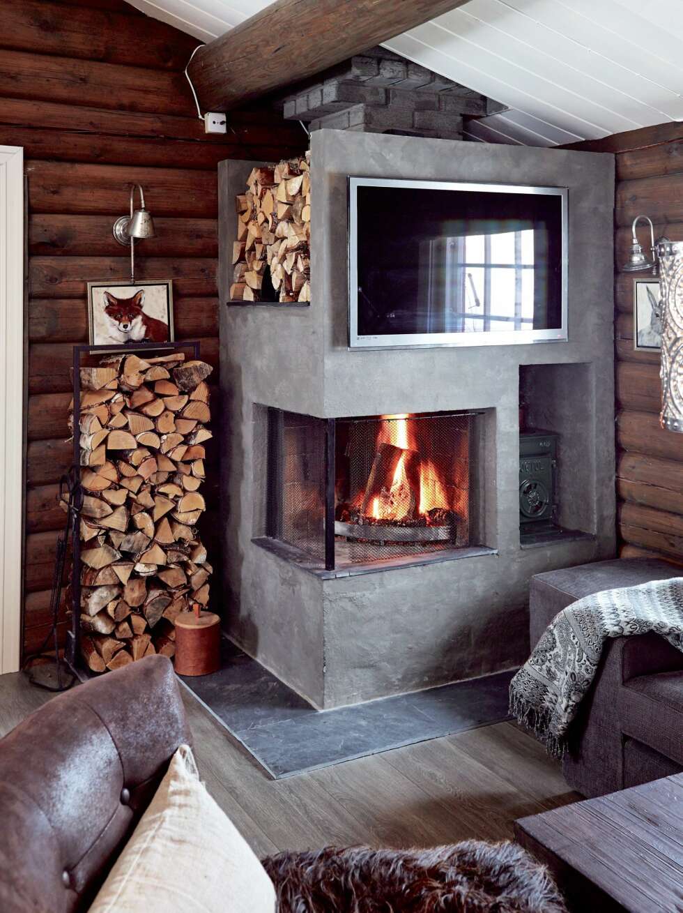 Nytt utseende: Det er faktisk mulig å forvandle en sliten rød tegelsteinspeis til et stilrent, moderne ildsted. Den gamle peisen er egentlig ikke borte, men har altså fått en total makeover. Nytt utseende: Det er faktisk mulig å forvandle en sliten rød tegelsteinspeis til et stilrent, moderne ildsted. Den gamle peisen er egentlig ikke borte, men har altså fått en total makeover.