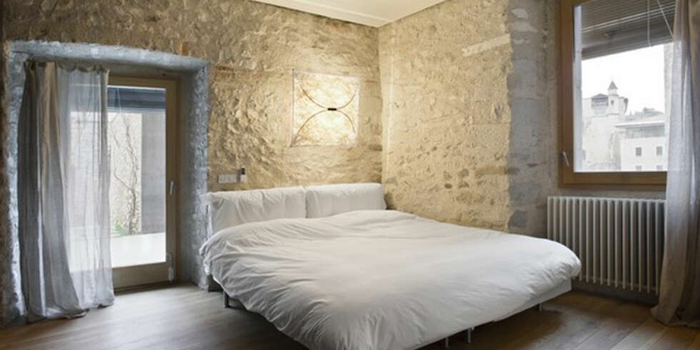 500 ÅR GAMMEL VEGG: Designerne forsøkte å beholde så mye av huset originale struktur som mulig. 500 ÅR GAMMEL VEGG: Designerne forsøkte å beholde så mye av huset originale struktur som mulig.