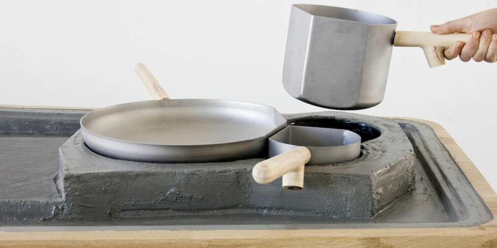 PRAKTISK OG MILJØBEVISST: En form i vulkansk stein som passer kokeapparat er bare noen av funksjonene som finnes i ""Paysage Culinaire"". PRAKTISK OG MILJØBEVISST: En form i vulkansk stein som passer kokeapparat er bare noen av funksjonene som finnes i ""Paysage Culinaire"".