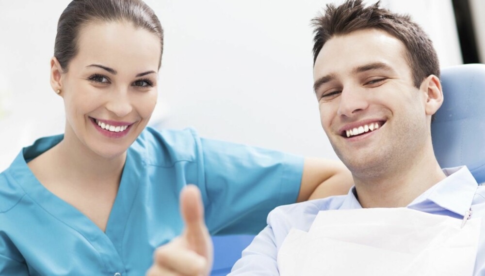 Man giving thumbs up at dentist office Man giving thumbs up at dentist office