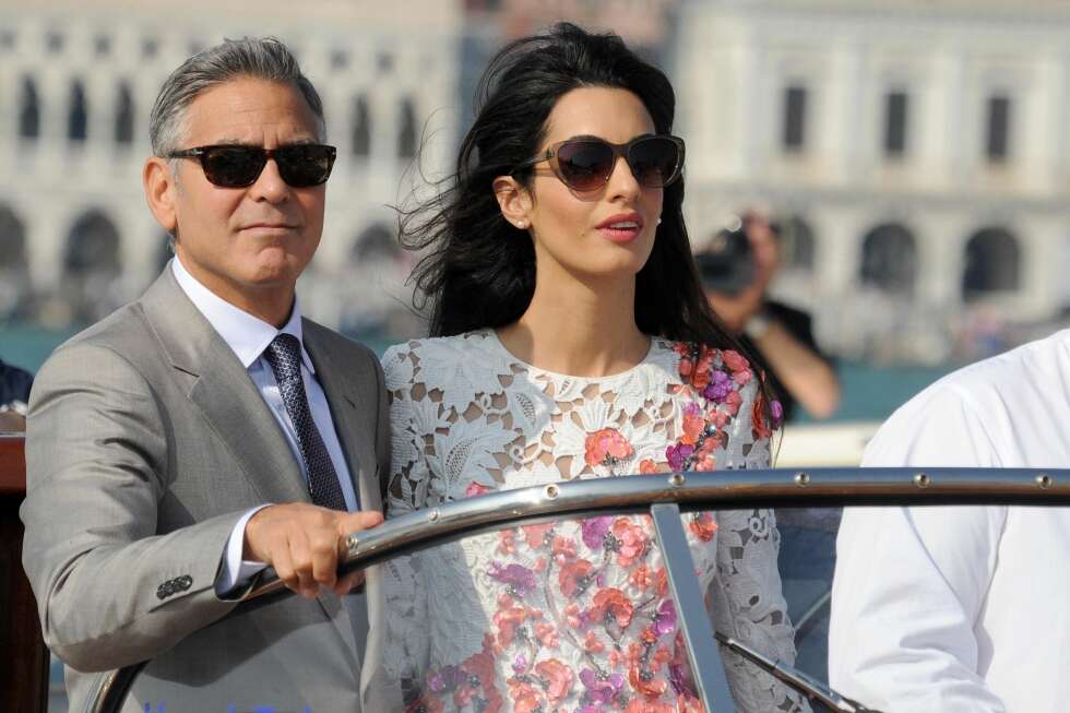 AMORS ARMER: I sommer giftet George Clooney seg i Venezia med sin vakre Amal Alamuddin. AMORS ARMER: I sommer giftet George Clooney seg i Venezia med sin vakre Amal Alamuddin.