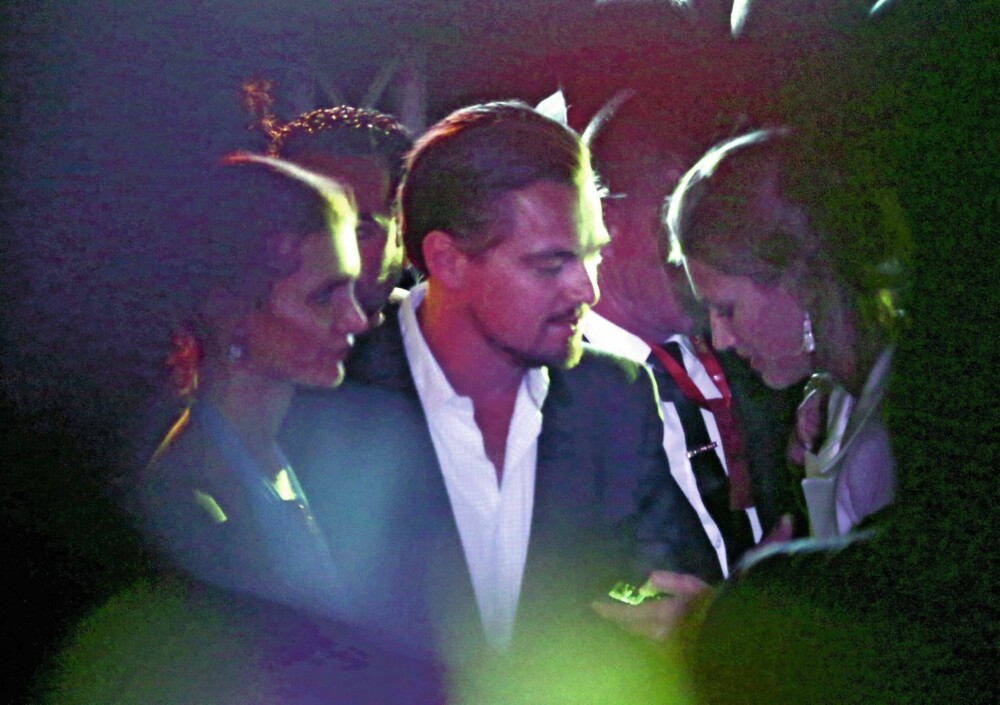 LEGENDE: Leonardo DiCaprio kastet glans over samme fest som John Carew. Han var som alltid omsvermet av damer. LEGENDE: Leonardo DiCaprio kastet glans over samme fest som John Carew. Han var som alltid omsvermet av damer.