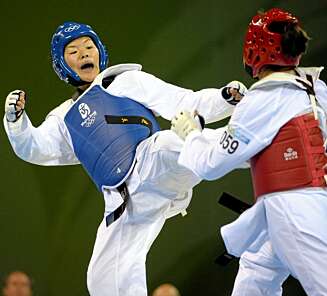 VANT SØLV: Nina Solheim sparket seg til sølv i Taekwondo i Beijing VANT SØLV: Nina Solheim sparket seg til sølv i Taekwondo i Beijing