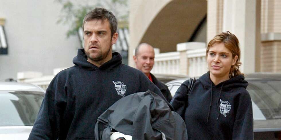 PENDLER NESTE: Robbie Williams har fått klar beskjjed av kjæresten Ayda Field. Det blir ikke aktuelt å flytte til England for at han skal få spilt med Take That. PENDLER NESTE: Robbie Williams har fått klar beskjjed av kjæresten Ayda Field. Det blir ikke aktuelt å flytte til England for at han skal få spilt med Take That.