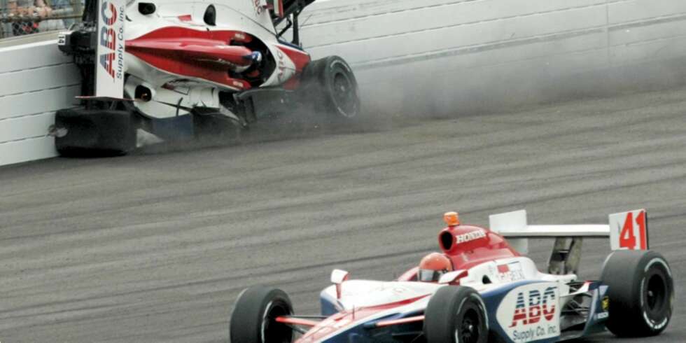 BAKLENGS ACTION: Vitor Meira, of Brazil, crashes into the wall as his teammate A.J. Foyt IV passes by during the Indianapolis 500 auto race at Indianapolis Motor Speedway in Indianapolis, Sunday, May 24, 2009. (AP Photo/Bill Friel) BAKLENGS ACTION: Vitor Meira, of Brazil, crashes into the wall as his teammate A.J. Foyt IV passes by during the Indianapolis 500 auto race at Indianapolis Motor Speedway in Indianapolis, Sunday, May 24, 2009. (AP Photo/Bill Friel)