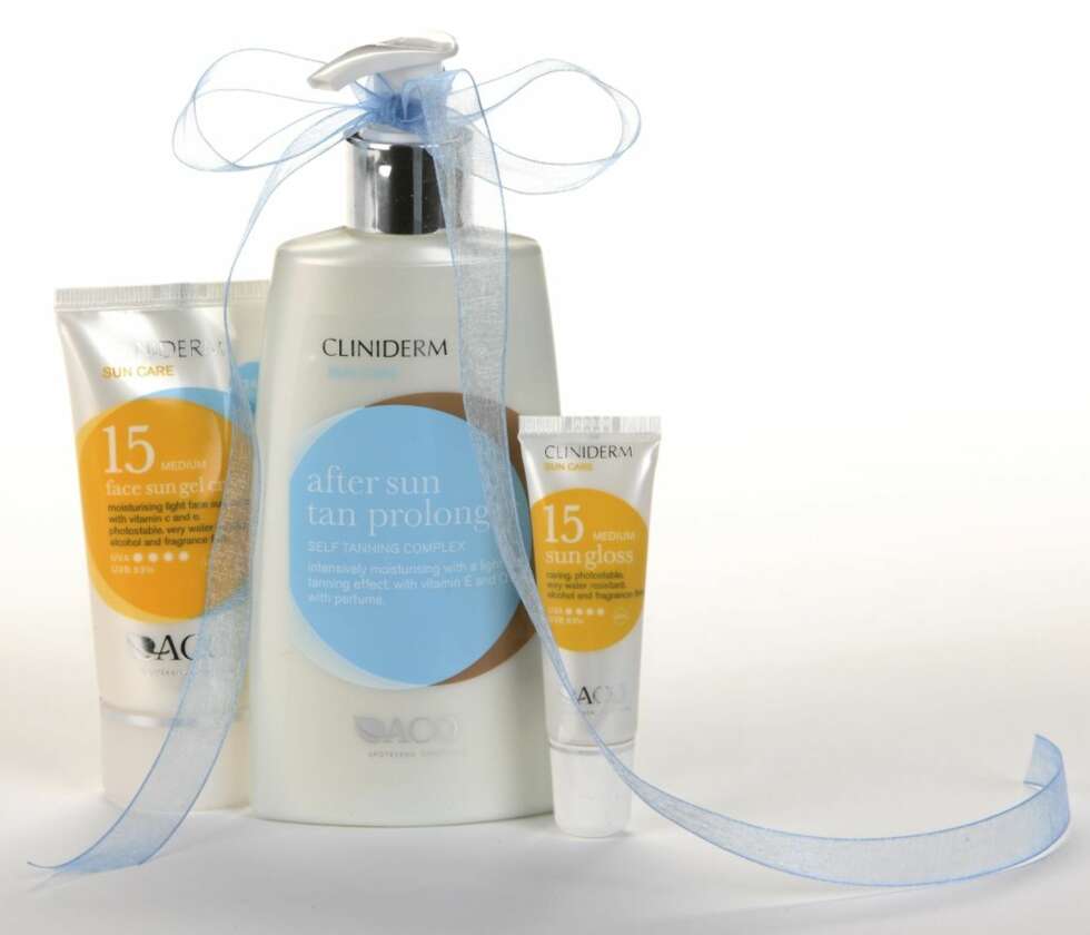 GAVE TIL DEG: Alle som deltar på reisen, får et sett med Cliniderm-produkter: Sun Gloss spf 15, After Sun Tan Prolonger og Face Sun Gel Cream spf 15. Produktene har en samlet verdi på 316 kroner. (Foto: Petter Berg/HM Foto) GAVE TIL DEG: Alle som deltar på reisen, får et sett med Cliniderm-produkter: Sun Gloss spf 15, After Sun Tan Prolonger og Face Sun Gel Cream spf 15. Produktene har en samlet verdi på 316 kroner. (Foto: Petter Berg/HM Foto)