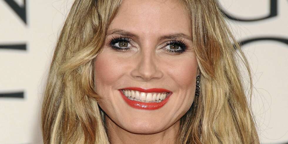 SOFT LOOK: Heidi Klum kler det meste, men er ofte å se med midtskill og myke bølger. SOFT LOOK: Heidi Klum kler det meste, men er ofte å se med midtskill og myke bølger.