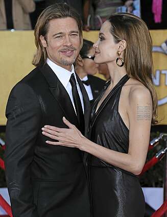 STRÅLER AV GLEDE: Angelina Jolie og Brad Pitt har opplevd mye motgang den siste tiden, men har kommet ut av det både sterkere og lykkeligere. STRÅLER AV GLEDE: Angelina Jolie og Brad Pitt har opplevd mye motgang den siste tiden, men har kommet ut av det både sterkere og lykkeligere.