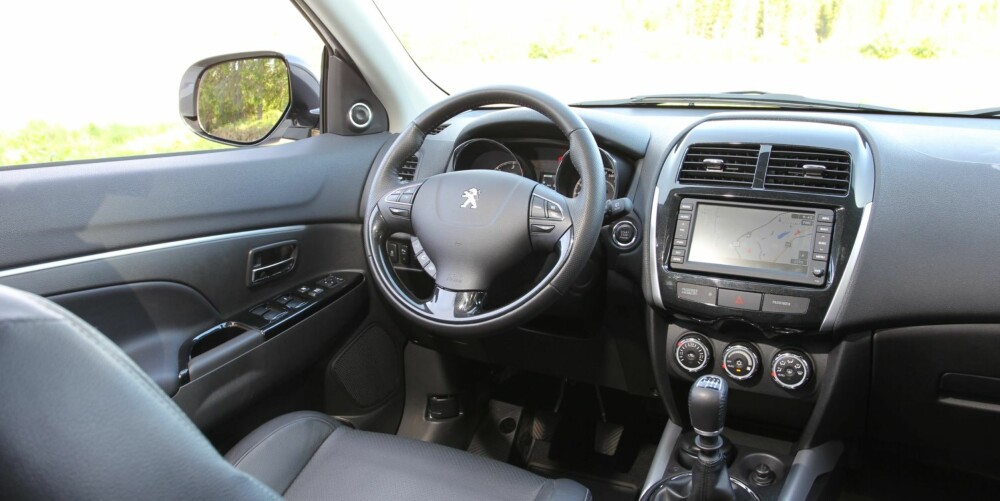 MYE UTSTYR: Med mye utstyr har Peugeot 4008 1,8 e-HDi vokst seg en klasse opp fra prisområdet rundt 350 000 kroner. FOTO: Terje Bjørnsen MYE UTSTYR: Med mye utstyr har Peugeot 4008 1,8 e-HDi vokst seg en klasse opp fra prisområdet rundt 350 000 kroner. FOTO: Terje Bjørnsen