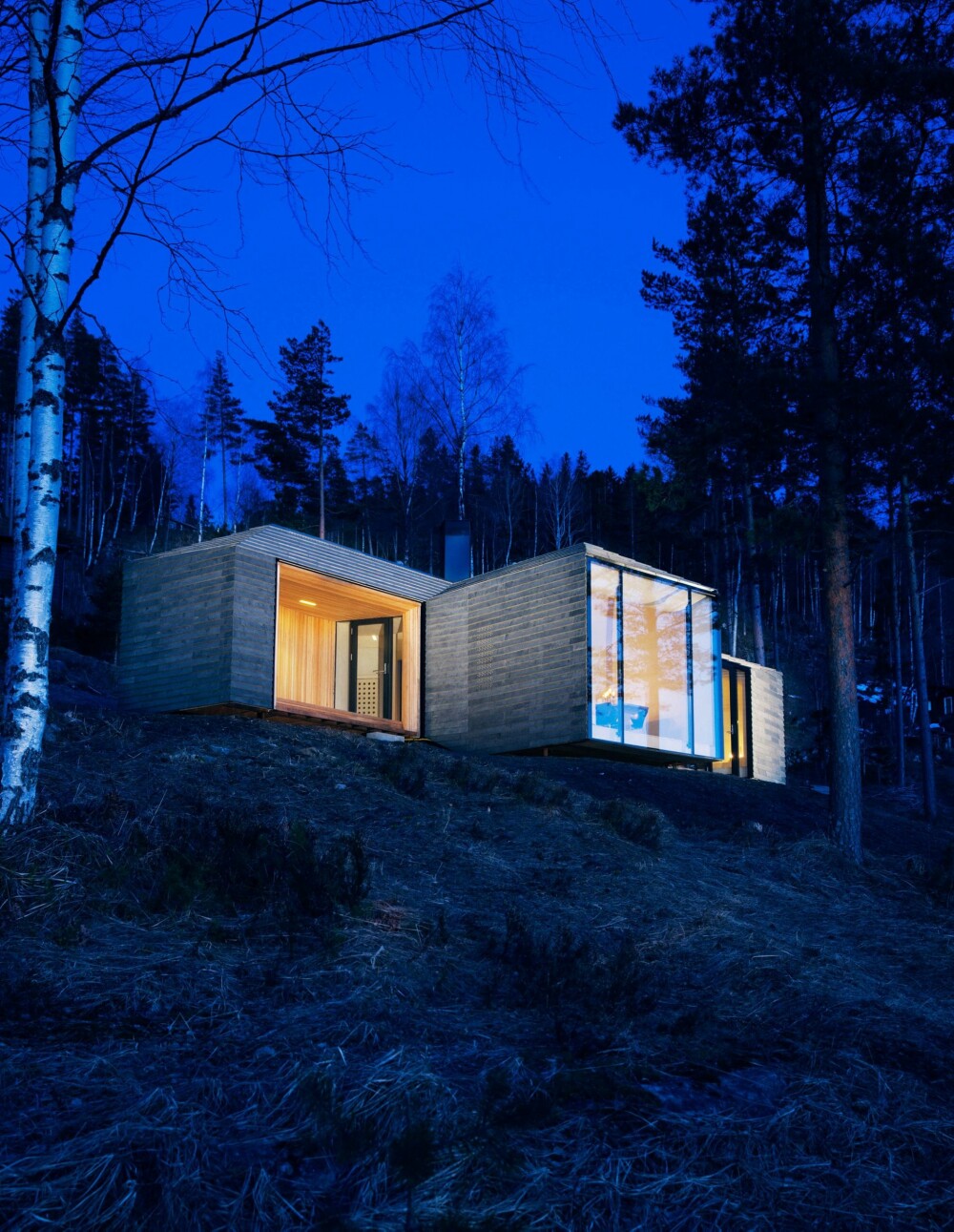 Kledd for natten: Det er arkitektkontoret Atelier Oslo som har stått bak hytteprosjektet på Norderhov utenfor Hønefoss. Foto: Lars Petter Pettersen 