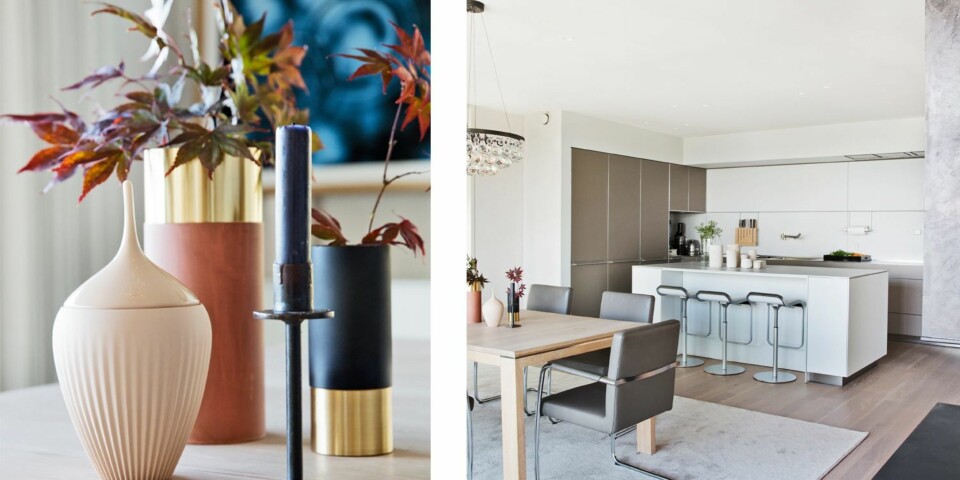 STORKJØKKEN: 1. Julie bruker lang tid på enhver ting hun finner til huset, enten det er stort eller lite. Vasen er fra & Tradition og lysestaken er fra Mina Milanda. Se hvor vakkert det er å bringe fargede blader fra naturen inn. 2. Kjøkkeninnredningen er fra Bulthaup. Barstolene er fra La Palma, spisebordet er fra Slettvoll og stolene Dexter, er egentlig lånt fra en restaurant, men de ble værende. Lampen over spisebordet er fra Ochre, og glasspærene er håndblåste. Tregulvene er i heltre hvitoljet eik.