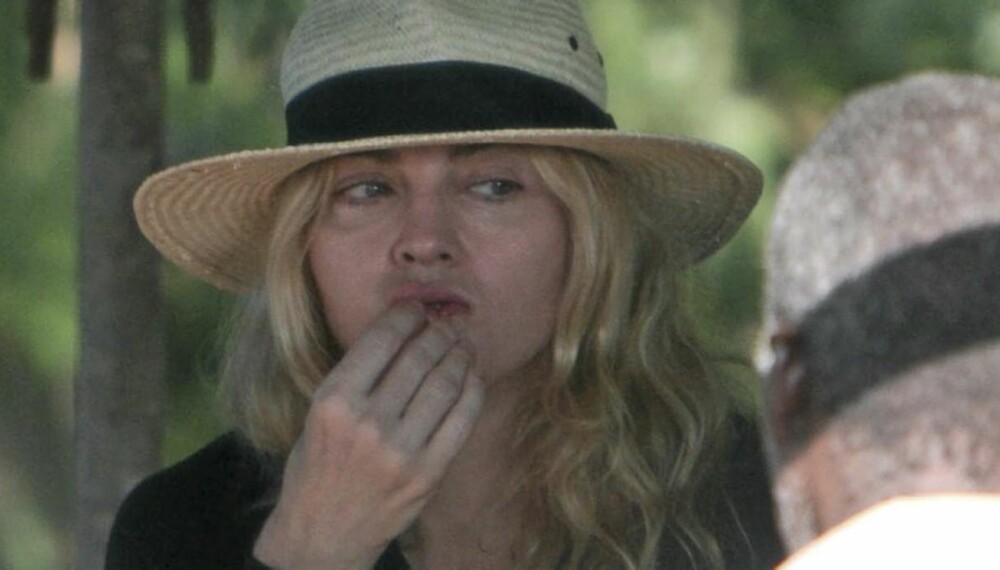 USIKKER: Det er slett ingen selvfølgelighet at Madonna drar hjem fra Malawi med lille Mercy.