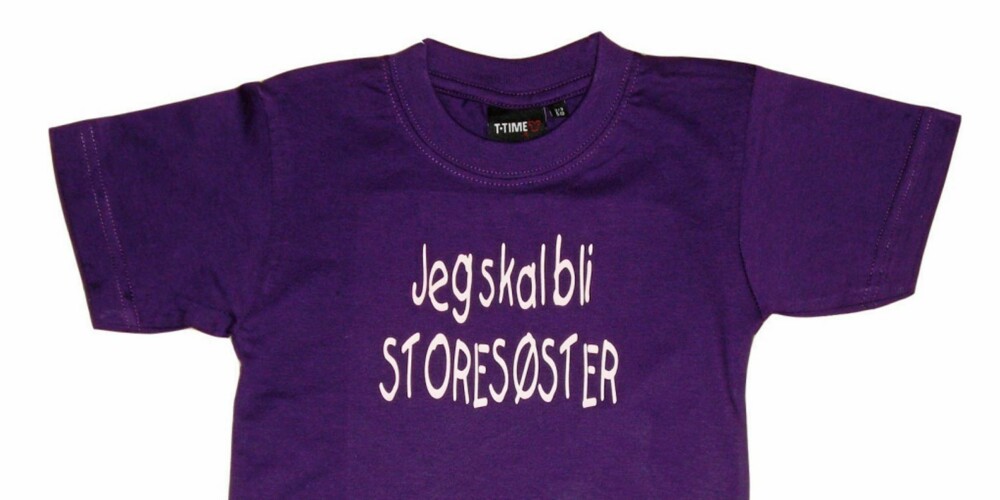 SPRE ORDET: Med denne t-skjorten kan du overraske familie og venner med familieforøkelsen. Koster kr 100,- hos lillemille.dk.
