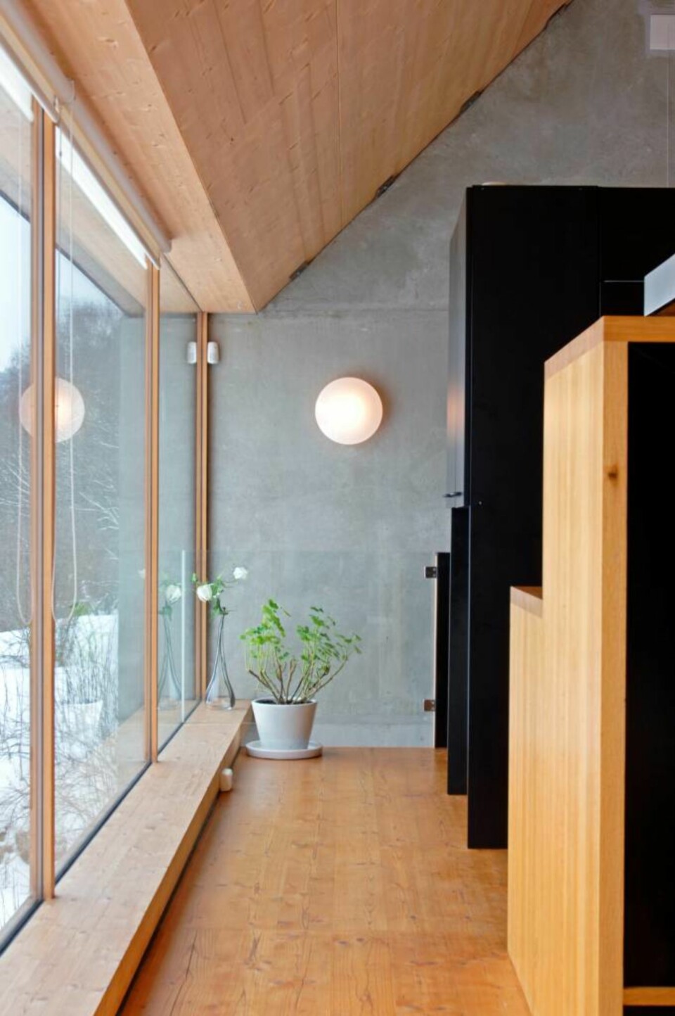 Kjøkkenet er tegnet av arkitekt Knut Hjeltnes og produsert hos Wollan Tre Design.