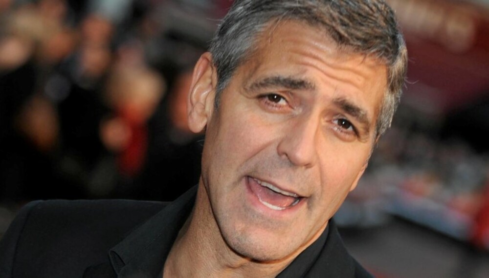 SURVER: George Clooney tok ikke nederlaget som en mann. Han mener at Hugh Jackman stjhal tittelen som verdens mest sexy mann fra ham.
