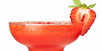 Frozen strawberry daiquiri alcohol cocktail. Isolated on white background