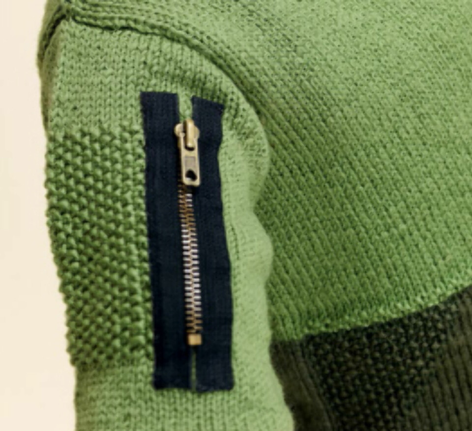DETALJ: Glidelås på armen.