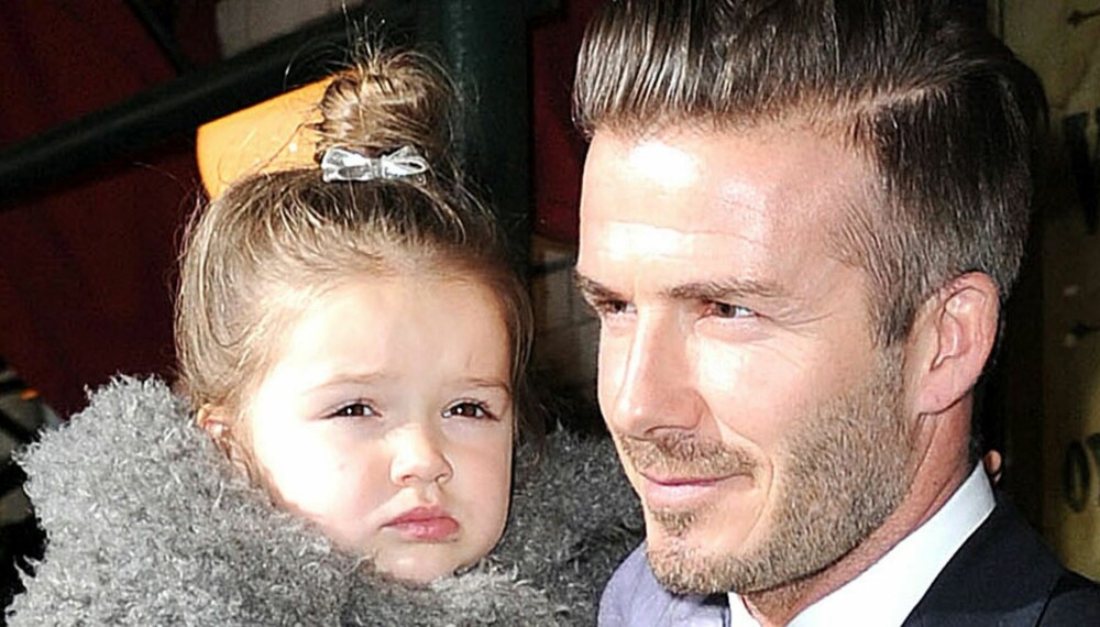 MYK MANN: David Beckham er en av verdens mest sexy menn, men sammen med datteren Harper viser han frem sin myke side.