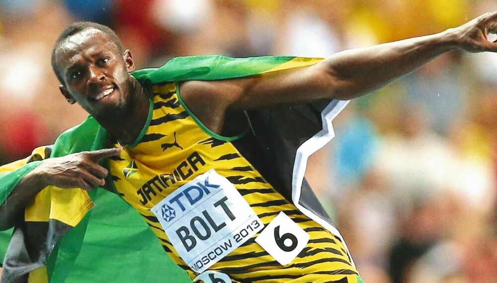 SIGNATUREN: Jamaicaneren er kjent for å leke med kameraene etter løp. Her gjør han signatur-poseringen sin etter seieren på 100-meteren i Moskva.