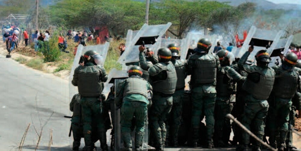 I Barquisimeto, Venezuela, verdens niende farligste by, kan politiets gatekamper mot de voldelige gjengene ofte minne om en ren krig.