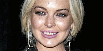 SMILER IGJEN: Lindsay Lohan fikk tilbake vesken sin, og tok det med fatning at kontantene var vekk som svisker.