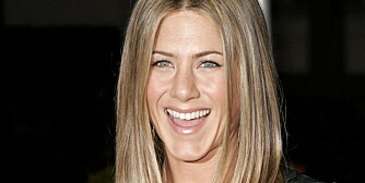 LYKKEN SMILER: Jennifer Aniston er endelig lykkelig igjen - tre år etter skilsmissen