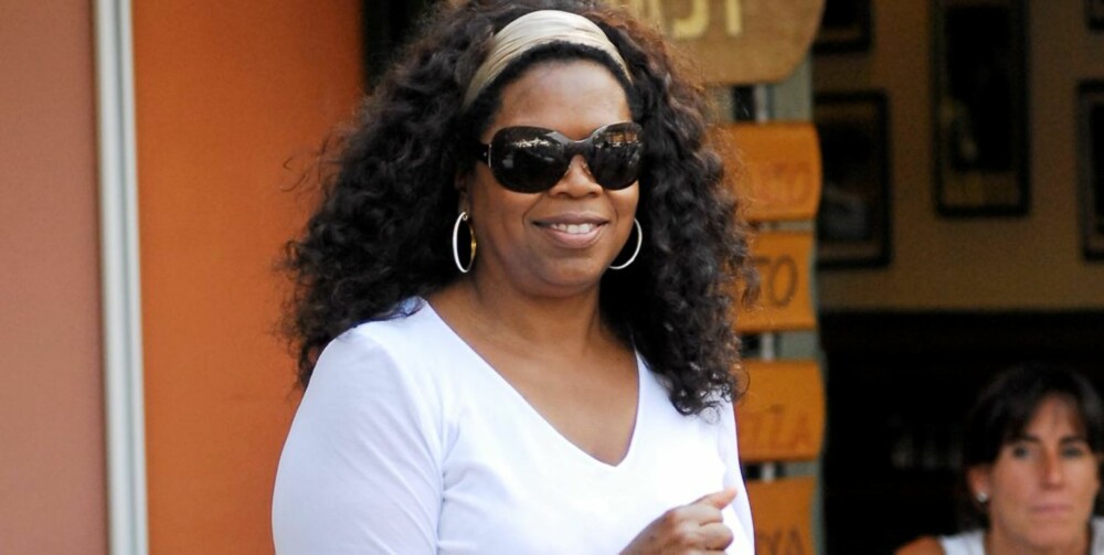 TJENER FETT: Oprah har all grunn til å smile - hun tjener nesten 4 millioner kroner dagen!