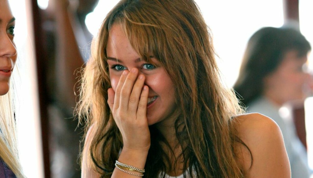 FORTSETTER: Miley Cyrus har gjort "Hannah Montana" til en farsott, og nekter for at hun har planer om å slutte.