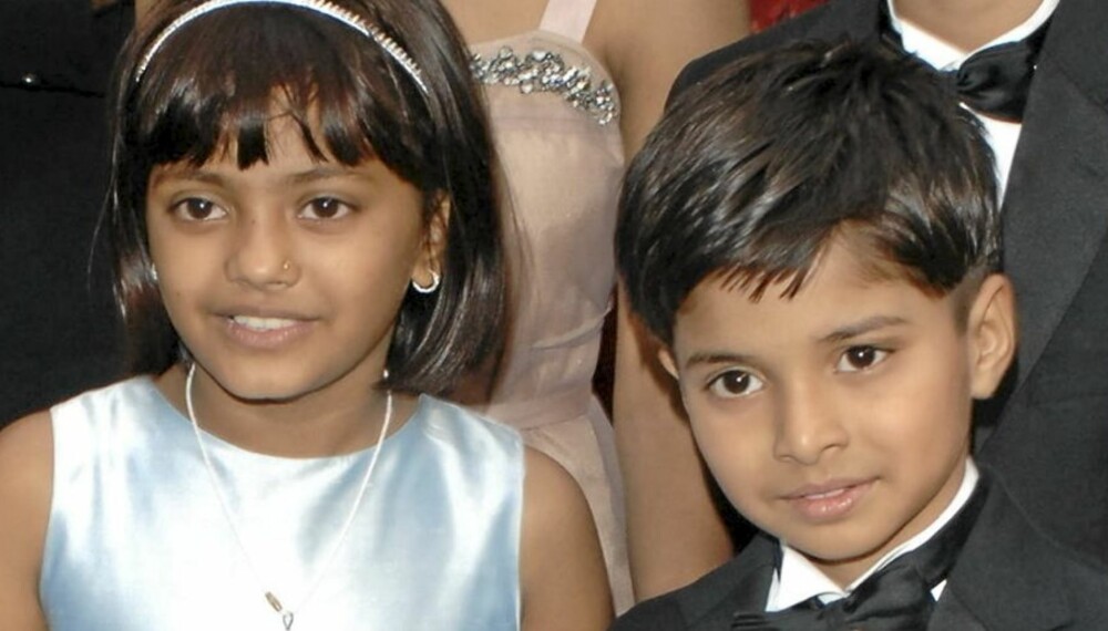 MILLIONÆRER?: De to barnestjernene Azharuddin Mohammed Ismail og niårige Rubina Ali får ikke skolegangen sin. Foreldrene vil heller smi mens jernet er varmt og bruke barna i reklameoppdrag.