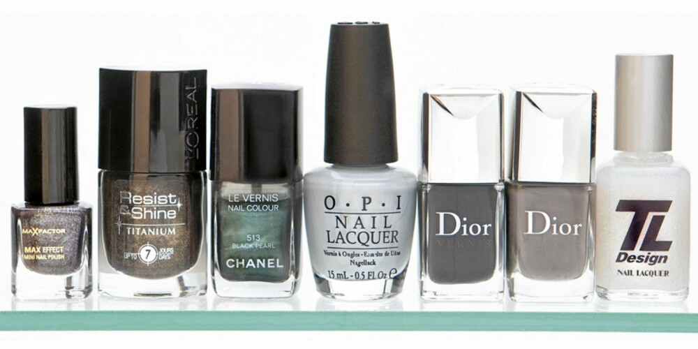FRA VENSTRE: Max Factor Max effect mini nail silver (kr 69), L'Oréal Resist and Shine 735 (kr 115), Chanel Le vernis black pearl (kr 210), OPI Nail lacquer I want to be a-lone star (kr 159), Dior Le vernis perfecto (kr 215), Dior Le vernis gris montaigne (kr 215), TL Design Nail lacquer magic dust (kr 149).
