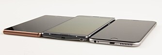 TREKLØVER: Ikke så lett å se hvem som har størst skjerm. Fra venstre Sony Xperia Z3 med 5,2 tommers skjerm, i midten Samsung Galaxy Note 4 med 5,7 tommers skjerm og til høyre iPhone 6 Plus med 5,5 tommers skjerm.