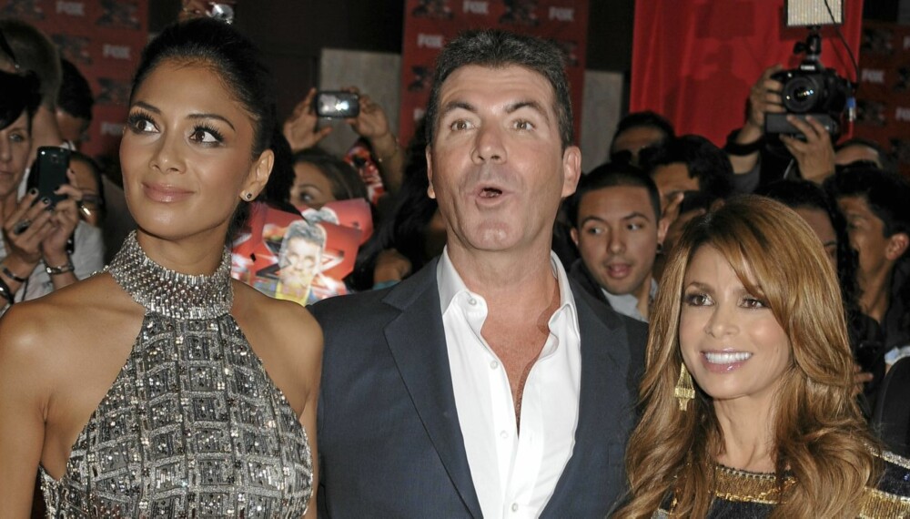 Nicole Scherzinger, Simon Cowell og Paula Abdul dømmer strengt, men rettferdig i X Factor USA. Ikke alle er enig med dem. Nicole Scherzinger, Simon Cowell og Paula Abdul dømmer strengt, men rettferdig i X Factor USA. Ikke alle er enig med dem.
