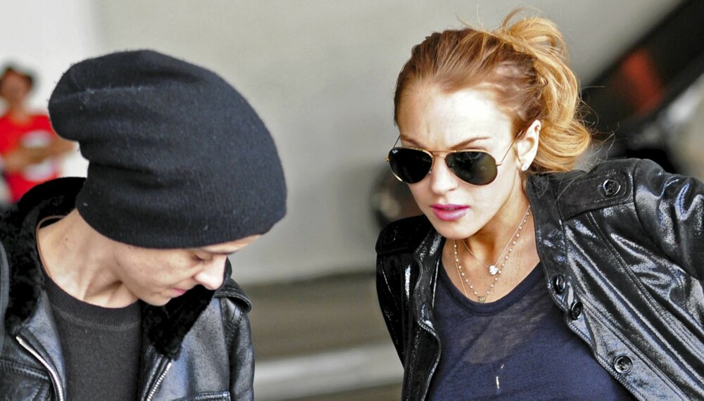 AV OG PÅ: Samantha Ronson og Lindsay Lohan på nyttårsaften. Lindsay skal ha blitt mishandlet av kjæresten gjentatte ganger.