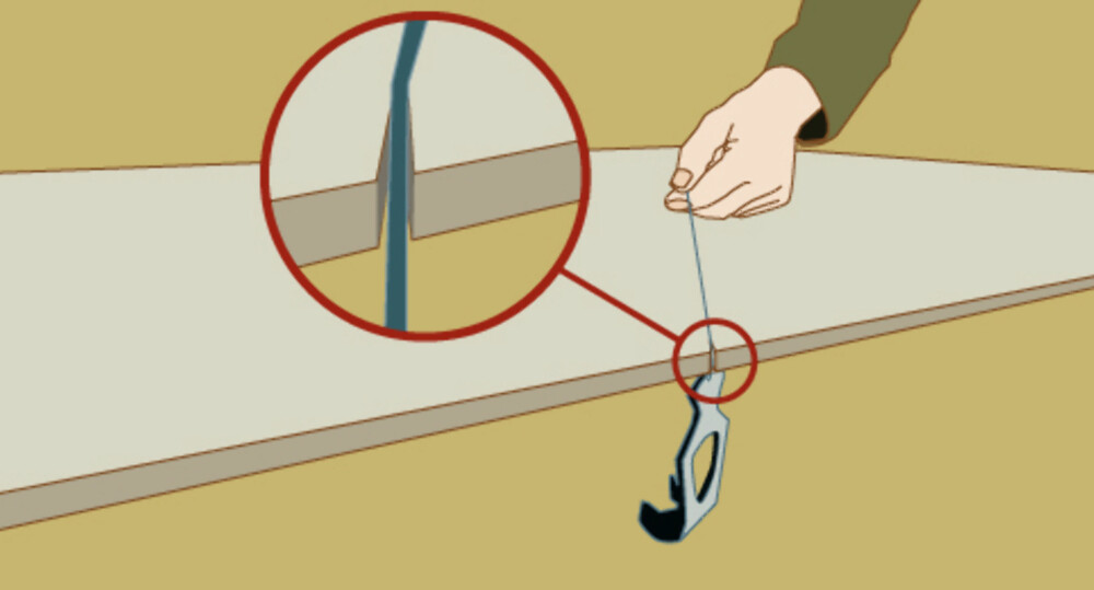 Gipsplate: Skal du lage diagonale streker kan du lage et lite hakk i kanten. Da henger enden uansett hvilken vinkel du har på snora.