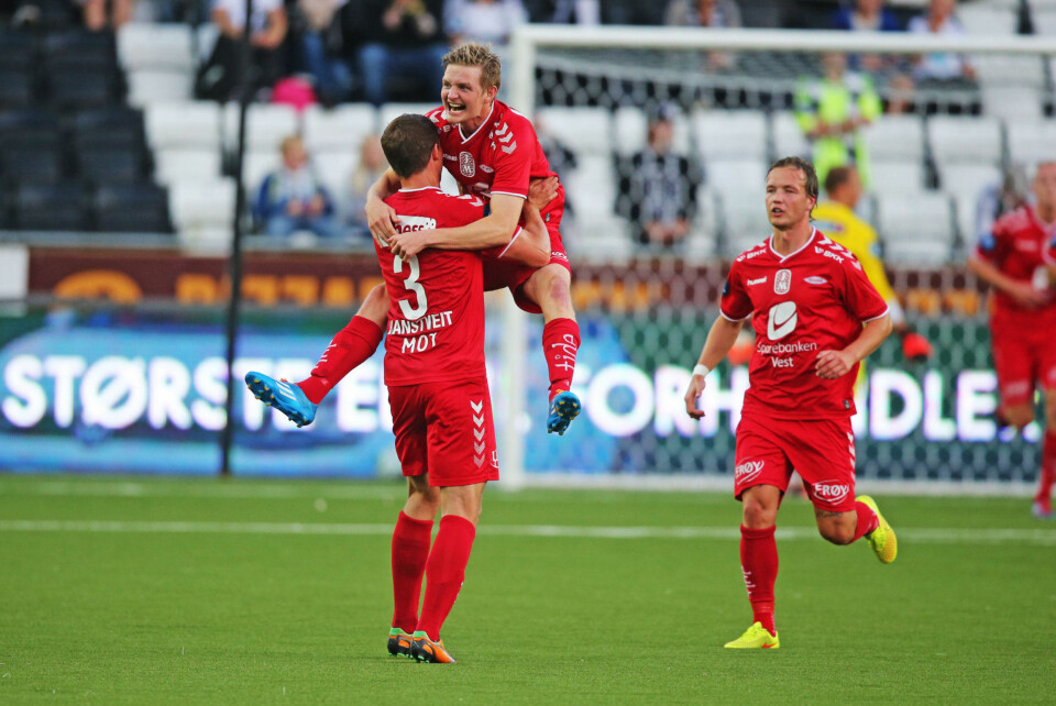 Erik Huseklepp jubler etter sin scoring for Brann i NM kampen i fotball mellom Odd og Brann på Skagerak Arena. Foto: Trond Reidar Teigen / NTB scanpix
