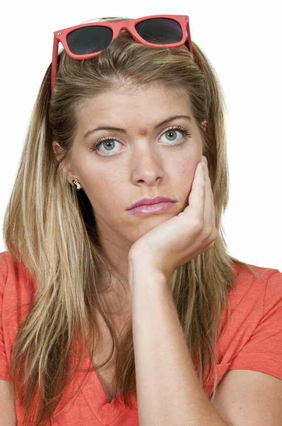 ØDELGGENDE: En velplassert kvise kan fort ødelegge humøret for resten av dagen. Foto: Colourbox