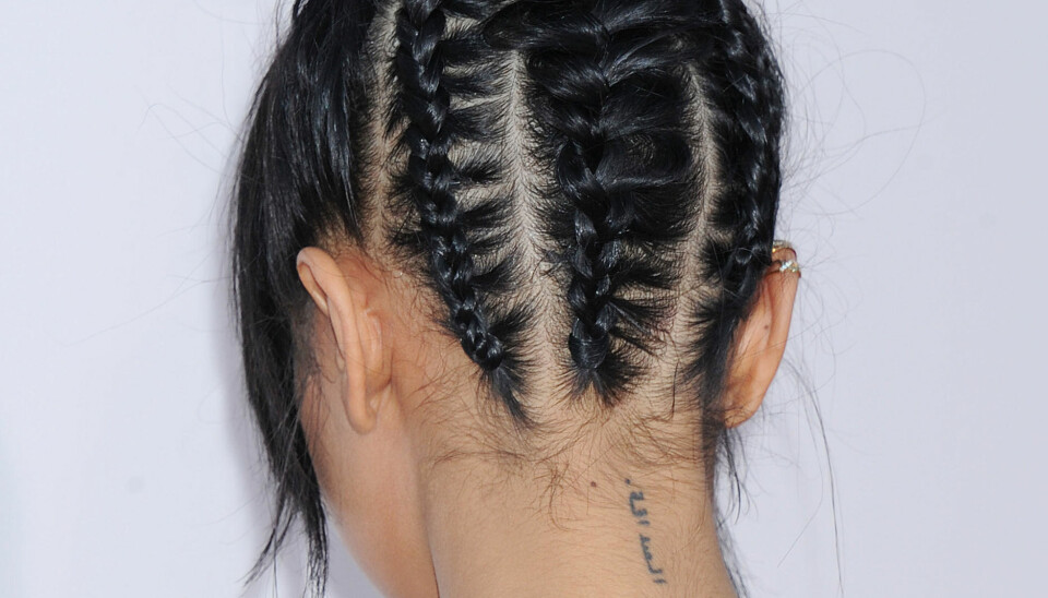 Karrueche Tran med intrikate fletter bak.