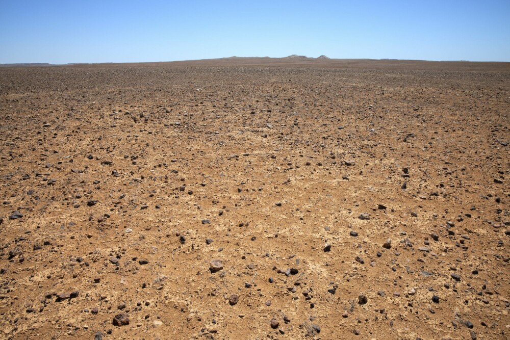 <b>SOM OVERFLATEN PÅ MARS:</b> Landskapet rundt Coober Pedy er ikke akkurat frodig. Ligner vel mer på planten Mars sin overflate. Ikke rart filmselskapene finner stedet attraktivt.