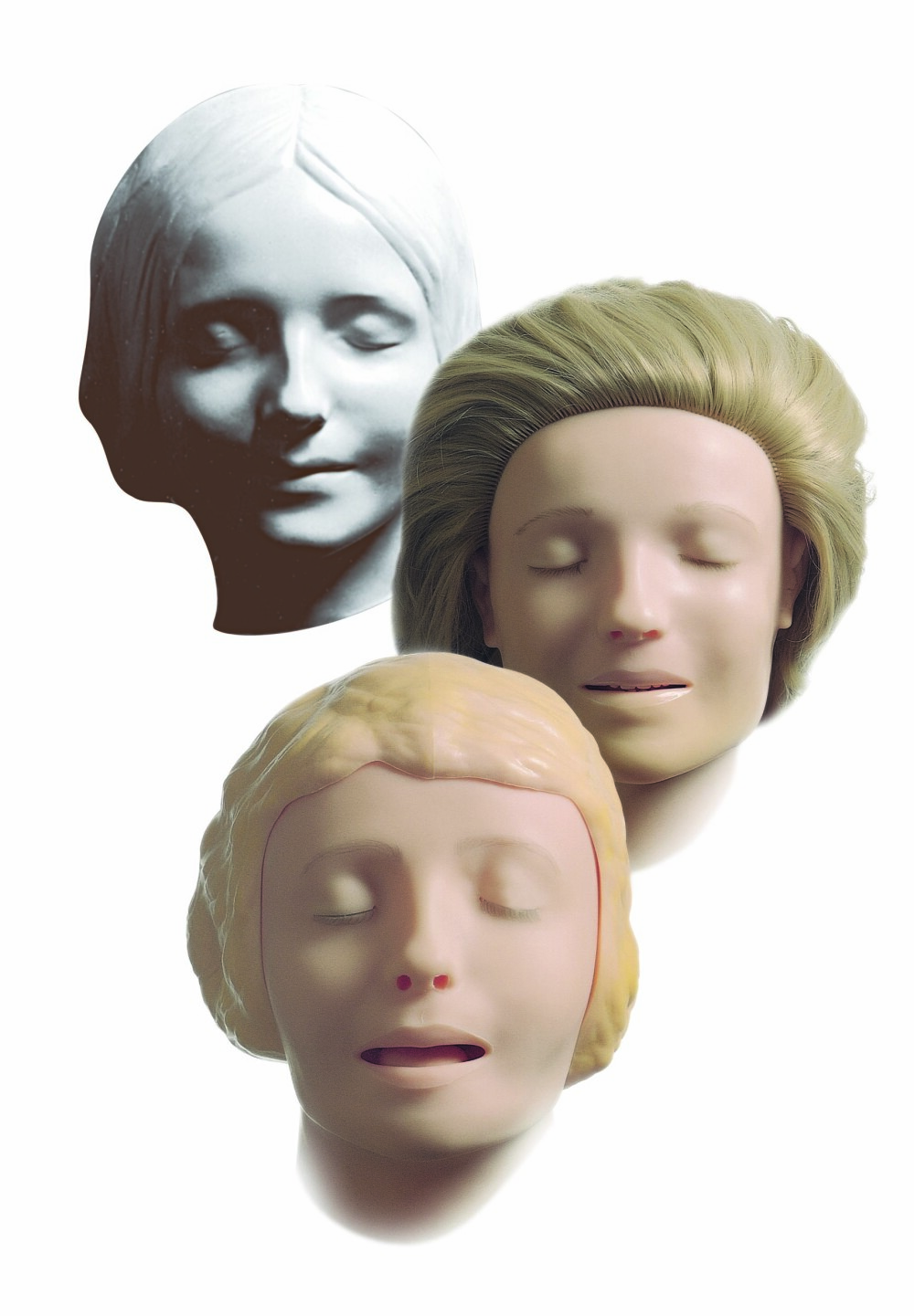 <b>LÆRDALS LIK:</b> Slik har Annedukkens ansikt endret seg fra dødsmasken i Paris til dagens Anne-dukke.