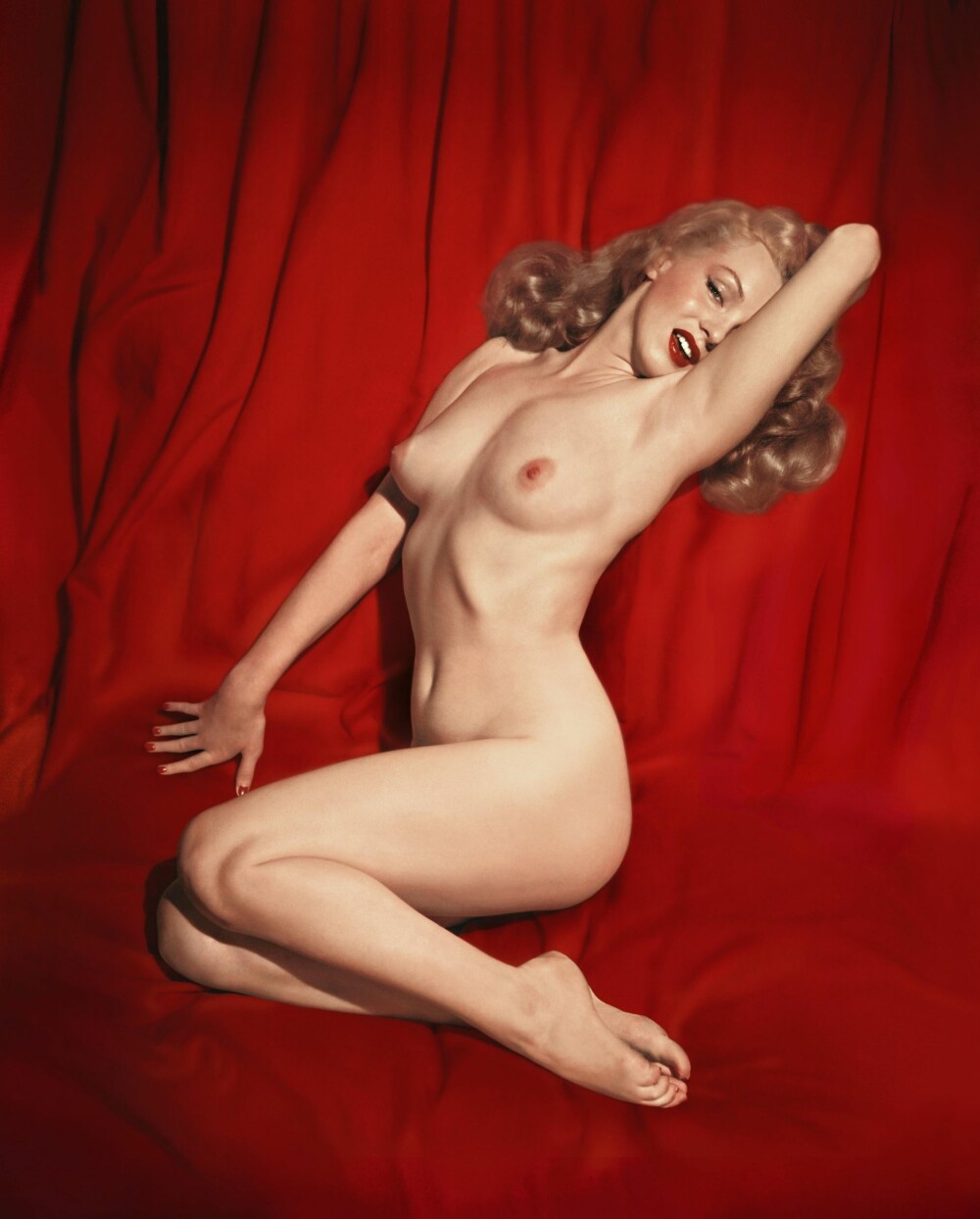 <b>PIN-UP:</b> Som ung og ukjent skuespiller stilte Marilyn Monroe opp på nakenbilder for å få noen kroner i kassa.