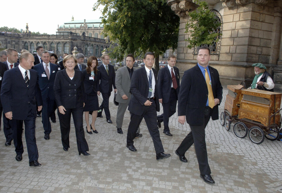 TILBAKE: I 2006 var Vladimir Putin tilbake i Dresden, denne gangen i et gjenforent Tyskland og med bundeskanzler Angela Merkel som vertinne. Putins opplevelser i Dresden 20 år tidligere har preget hele hans regjeringstid og dagens Russland, mener eksperter.
