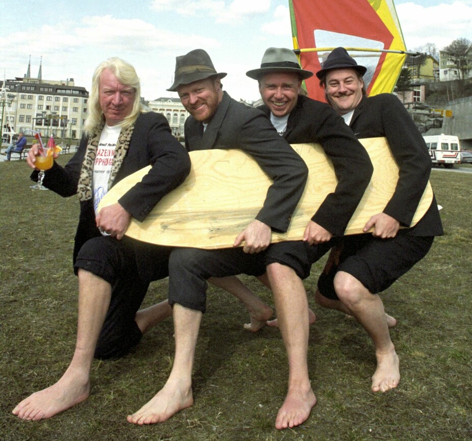 <b>MANGE SPILLOPPER:</b> Rockabilly-bandet har hatt mye moro på veien helt siden de startet i 1979. Her med surfebrett i Skien i 1993, da de var oppvarmere for selveste The Beach Boys.