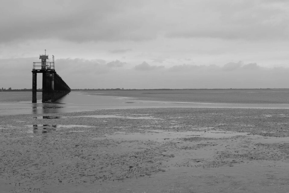 MIRAKULØST: Marerittferden med halv fallskjerm endte her, på langgrunnen utenfor Shoeburyness. Akkurat dypt nok til å slippe uskadet fra det, og to svømmetak senere, fast grunn under føttene.