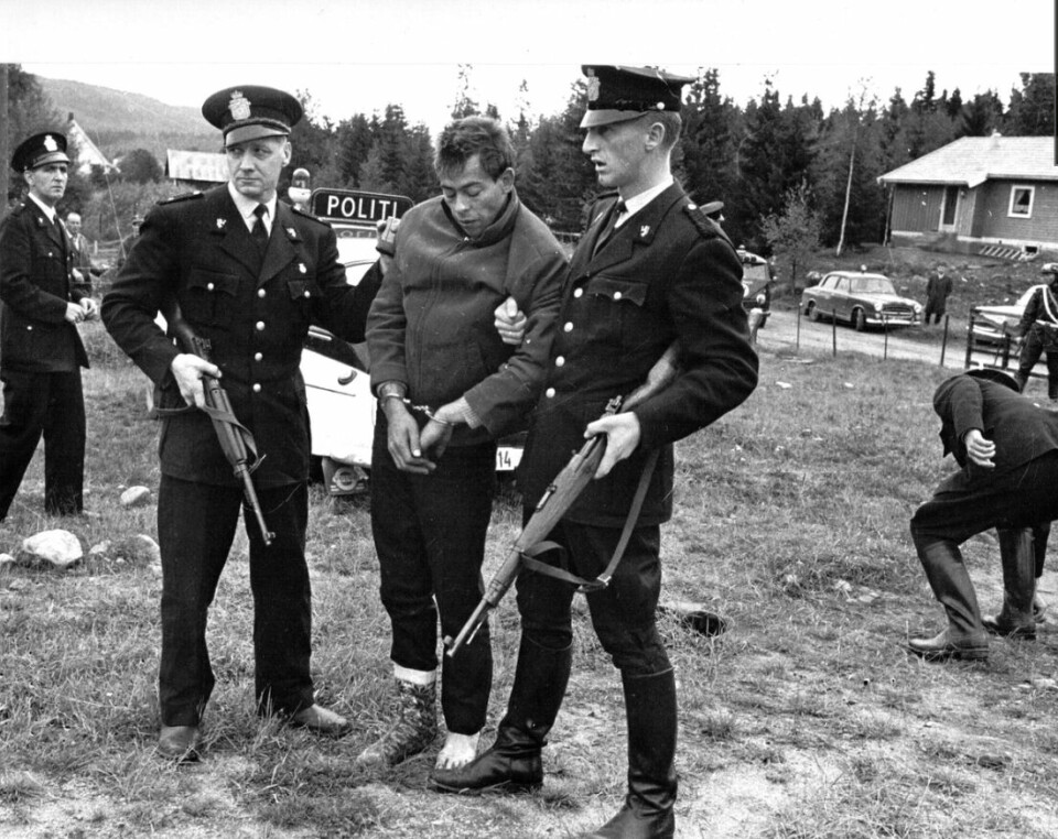 UNDER KONTROLL: Kjell Sigmund Hansen, en av medlemmene i Sæhlegruppa, etter pågripelsen.