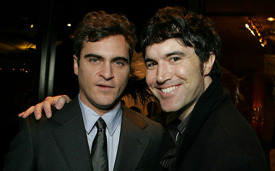 Kjendis: Tom Andersson ble ofte avbildet sammen med Hollywood-kjendiser og andre stjerner. Her sammen med Joaquin Phoenix.